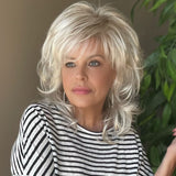 All over cascading wavy layers and a textured bang wig